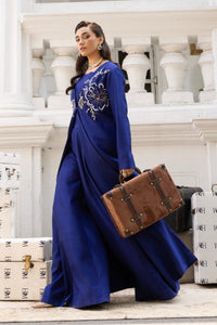 Huma Mistry Official Azurine jewelry piece featuring intricate silver design and blue gemstone accents.
