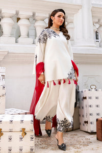 Estella by Huma Mistry Official featuring intricate embroidery and vibrant fabric, perfect for elegant traditional wear.