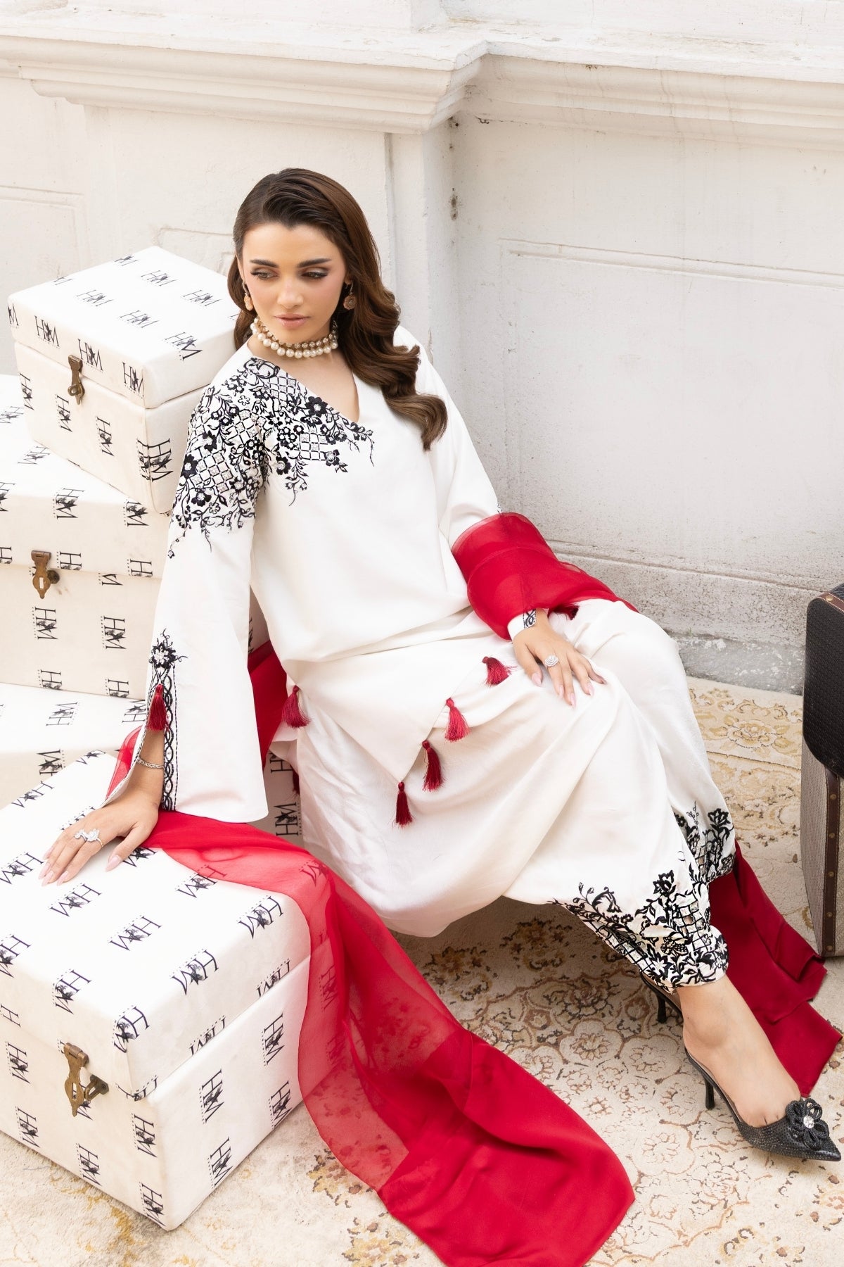 Estella by Huma Mistry Official featuring elegant jewelry with intricate design and gold accents.