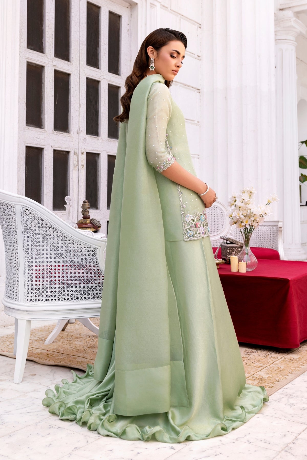 Delia by Huma Mistry Official featuring intricate embroidery on vibrant fabric, showcasing detailed craftsmanship and elegant design.