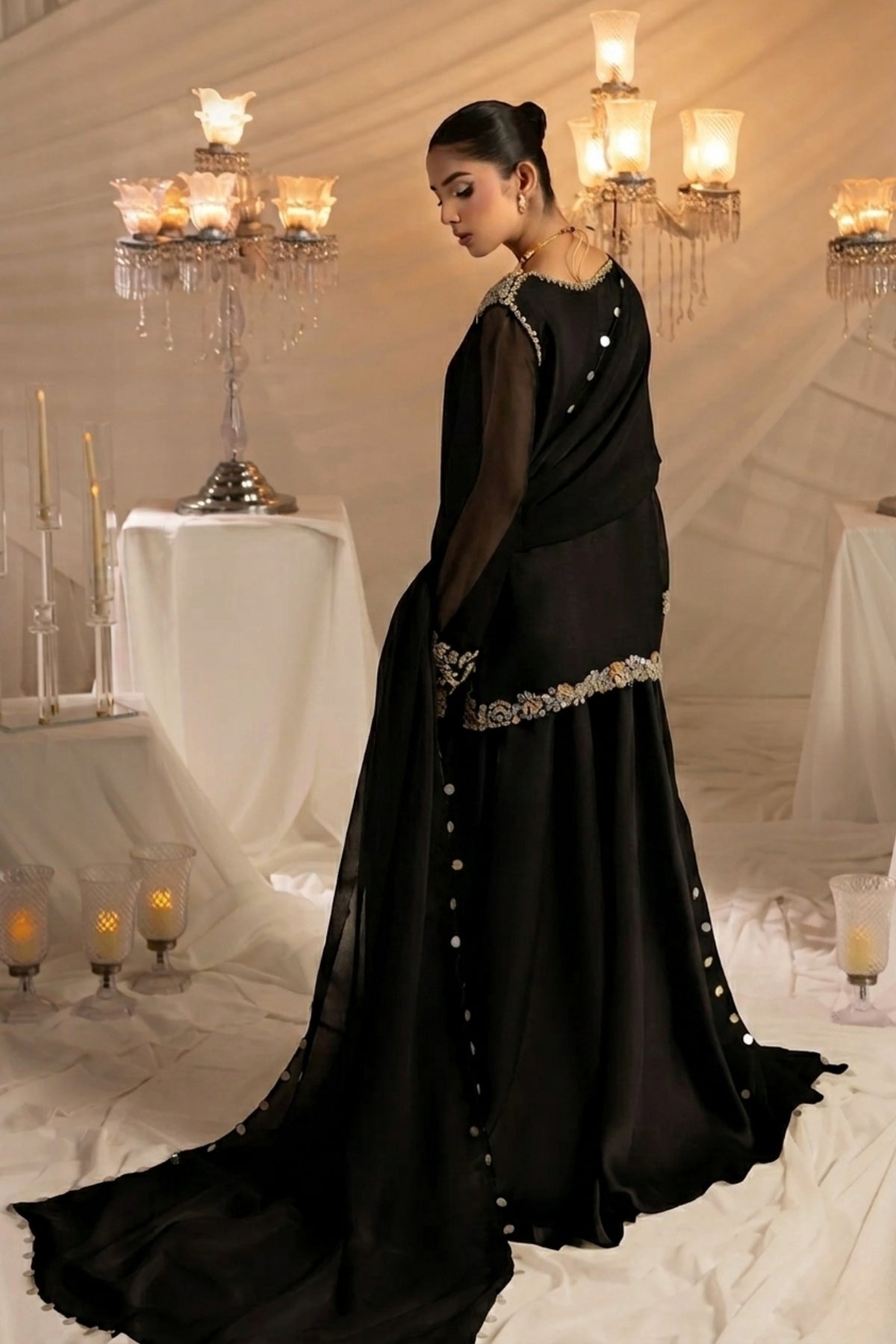 Huma Mistry Official Lucina, elegant jewelry piece with intricate design, featuring silver and gemstone accents.