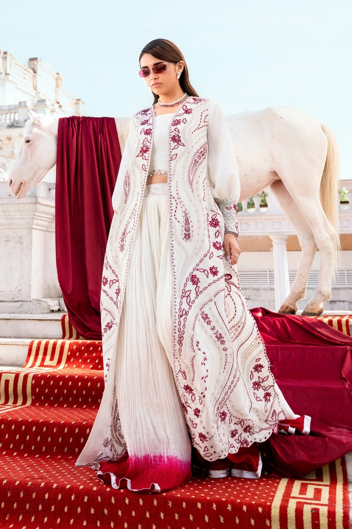 Huma Mistry Official Elira jewelry piece featuring intricate design with silver and gemstone accents on a white background.
