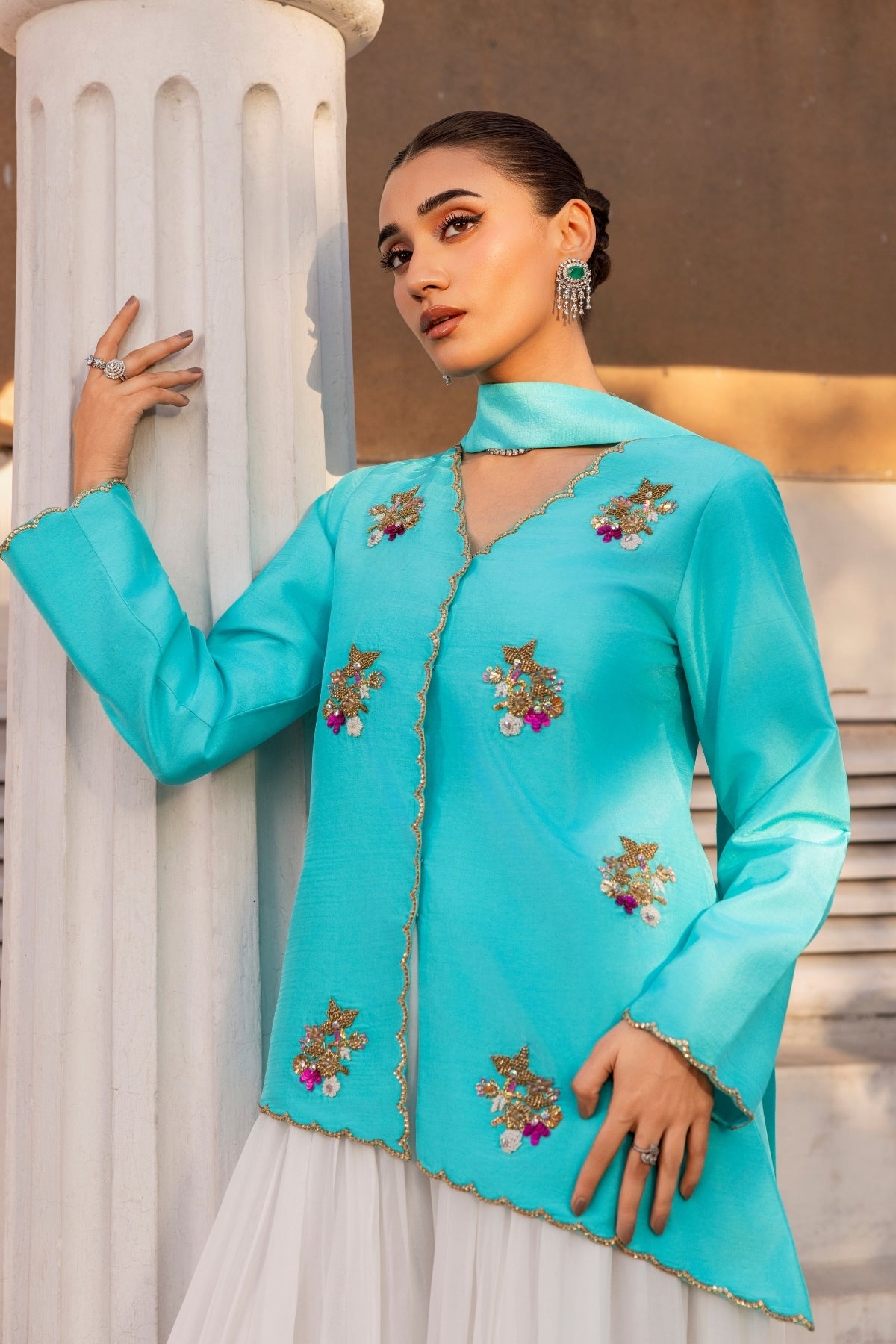 Huma Mistry Official Iris sculpture with intricate details and vibrant colors, showcasing artistic craftsmanship.