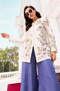 Elegant Eloise dress by Huma Mistry Official featuring flowing fabric and intricate detailing on a model.